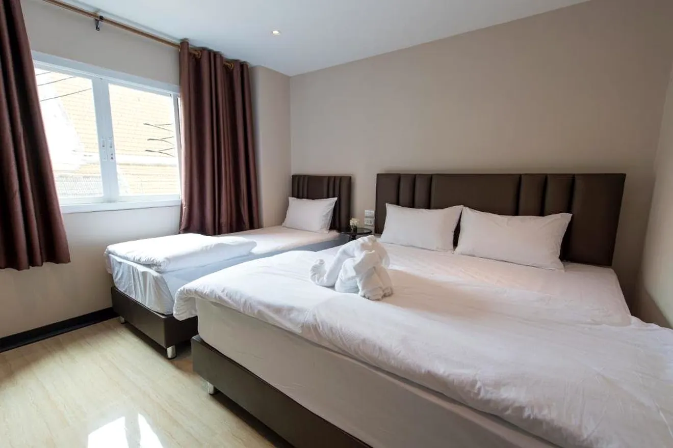 Family Room with king and single bed at Let's Zzz Bangkok